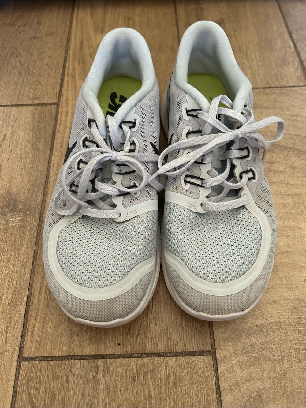Nike Women’s White and Light Gray Mesh Running Sneakers